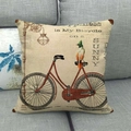 Funda de cojín de lino vintage con bicicleta y pájaro de colores en sofá gris - Estilo Bicicleta Roja Con Borde De Cuero (4)