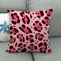 Pink leopard print linen pillow cover featuring bold animal patterns on a grey fabric sofa - Pink Leopard Style (13)
