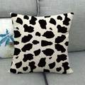 Linen square pillow cover with black cow print pattern on a natural beige background - Cow Spot Style (14)