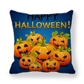 Detail of Jack-o'-lanterns and Happy Halloween text on a navy peach skin pillowcase - Dark Blue Pumpkin Lanterns (17)
