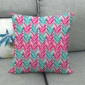 Pink and turquoise chevron geometric linen throw pillow cover on a modern sofa - Pink and Teal Chevron Style (10)