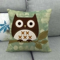 Linen cushion cover with cartoon owl print and white polka dots on a sage green base - Owl with Polka Dot Background