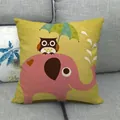 Linen cushion cover with yellow cartoon elephant and owl print on a grey sofa - Pale Yellow Pink Elephant Owl Style (8)