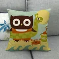 Linen cushion cover with colorful cartoon animal print on a grey fabric sofa - Summer Beach Animal Illustration Style (10)