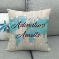 Detail of world map print and Adventure Awaits lettering on linen pillow cover - Watercolor World Map Adventure Style (18)