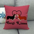 Close-up of linen pillow cover with Corgi Kisses illustration on a grey sofa - Corgi Kisses Heart Style (17)