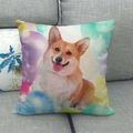 Close-up of linen cushion cover featuring a vivid Corgi print on a grey fabric sofa - Watercolor Tongue Portrait (20)