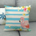 Linen flamingo throw pillow cover with blue stripes and tropical flowers on sofa - Blue Stripe Single Flamingo