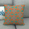 Square linen pillowcase with colorful mandala geometric pattern on a grey sofa - Multicolor Mandala Geometric Pattern