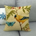 Detail of vintage linen cushion with bird and berry print on a grey sofa - 18x18 Inch / Yellow Bird Style (1)