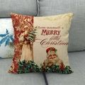 Funda de cojín navideño de lino con Papá Noel y árbol sobre un sofá gris - 45x45 cm / Estilo Papá Noel Feliz Navidad (3)