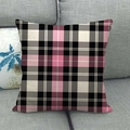 Close-up of pink and grey plaid linen cushion cover on a soft grey fabric sofa - Pink Black Gray White Weaved Plaid Style (16)