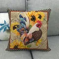 Housse de coussin en lin avec motif coq et tournesol sur un canapé gris - Coq à Bordure à Carreaux (9)