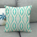 Macro detail of geometric teal ikat diamond pattern on textured linen cushion cover - Cyan Beige Geometric Diamond (17)