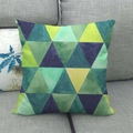 Housse de coussin en lin avec motifs géométriques triangle vert et bleu sur canapé - Style Géométrique Vert Émeraude Bleu Jaune (13)