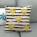 Close-up of linen cushion cover with black stripes and shimmering gold hearts - Black White Stripes Golden Heart
