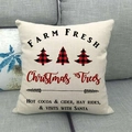 Linen Christmas pillow case with Farm Fresh Trees print on a gray sofa - Farm Fresh Three Trees Style