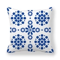 Close-up of geometric blue tile pattern and texture on peach skin pillow cover - Blue and White Mediterranean Moroccan Tile (14)