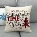 Detail view of linen Christmas pillow case with red plaid lettering on grey sofa - 18x18 Inch / Beige Wonderful Time Plaid Decor (8)
