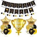 Detailed black and gold graduation party set with Congrats Grad balloons and banners - Graduation Trophy Set