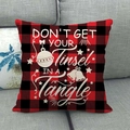 Red and black buffalo plaid Christmas pillow cover with white festive text on a sofa - Red Black Plaid - Tinsel Tangle (Style 9)