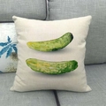 Close-up of linen pillowcase with watercolor cucumber print on a grey sofa - Off-White Hand-painted Double Cucumber Style (5)