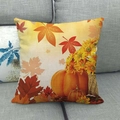Modern autumn linen pillow cover with orange pumpkin and sunflower print on sofa - Pumpkin and Sunflower Style