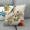Vintage linen pillow cover featuring birds and roses with French typography on a grey sofa - Twin Birds And Red Rose Style (4)
