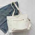 Minimalist off-white large capacity tote bag with front zipper pocket and side slots - White
