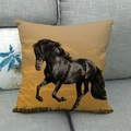 Linen cushion cover with running horse pattern on a grey sofa in warm sunset lighting - Sunset Running Horse(20)