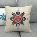 Linen decorative pillow cover with colorful geometric mandala pattern on a gray sofa - Radiant Floral Texture (5)