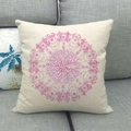 Close-up of coral and crab pattern on beige linen pillowcase resting on a sofa - Pink Coral Shell (11)