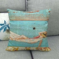 Close-up of linen pillow cover with vintage collage art of a woman in a hammock - Woman Resting in Hammock Pattern (8)