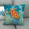 Detailed close-up of a linen cushion cover with an artistic orange sea turtle pattern - Orange Yellow Ocean Bubble Turtle (19)