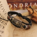 Retro multi-layer braided black leather bracelet with bronze clover charm and wooden beads - Black