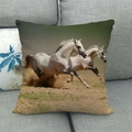 Linen pillow cover featuring two running white horses on a beige fabric background - Two White Horses Sand Run(10)