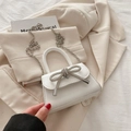 Elegant white mini crossbody bag with a sparkling silver rhinestone bow and chain strap - White