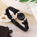 Retro punk black leather bracelet featuring a skull medallion and braided details - Black