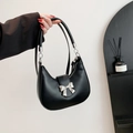 Borsa a mezzaluna nera minimalista con fiocco in metallo argento per le donne - Nero