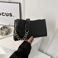 Minimalist black matte shoulder bag with a stylish chunky gold chain and leather strap - Black