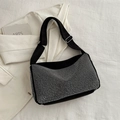 Fashionable black crossbody bag featuring silver rhinestones and adjustable strap - Silver
