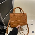 Chic brown quilted square handbag with dual handles and adjustable shoulder strap - Brown