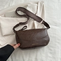 Coffee brown soft leather crossbody bag with vintage texture and wide patterned strap - Brown