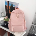 Stylish pink nylon backpack with multiple pockets and decorative zippers for women - Pink