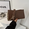 Minimalist dark brown rectangular shoulder bag with golden chain and matte leather finish - Brown