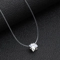 Floating square zircon pendant on a transparent fishing line necklace shown on black leather - Square
