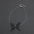 Minimalistischer schwarzer Schmetterling-Choker mit Kristallen auf unsichtbarer Kette - Schwarz