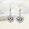 Boucles d'oreilles cœur œil bleu vintage avec cristaux et crochet en argenté - Style Coeur