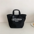 Minimalist black canvas tote bag with white lettering and leather reinforced handles - Black