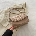 Quilted crossbody bag in light khaki faux leather with geometric stitching and flap closure - Khaki